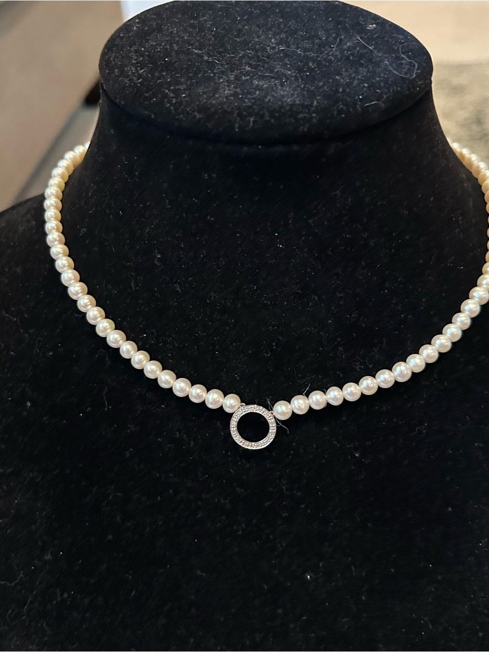 Pearl Cocker Necklace with Silver Jeweled Circle Pendant.